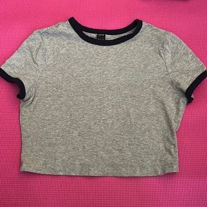 Cropped gray tee with navy blue detailing